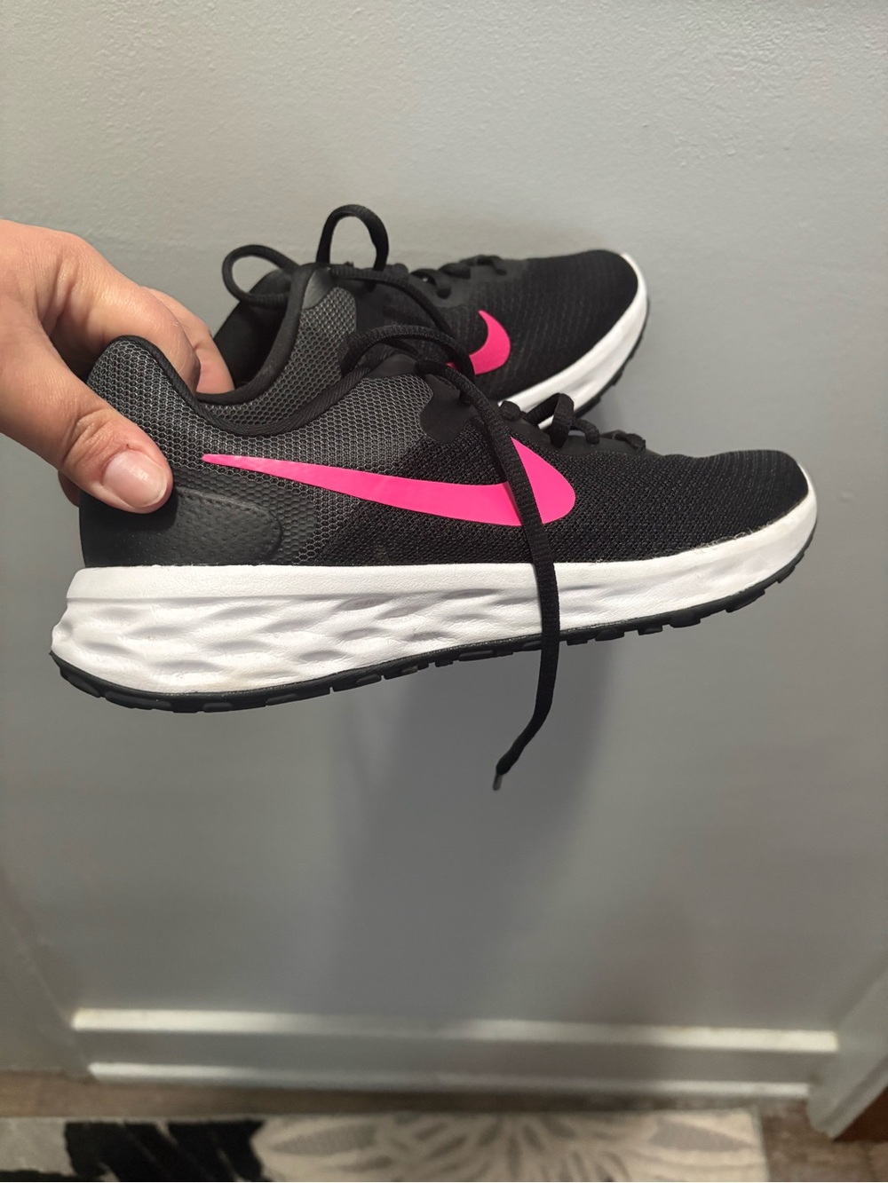 Nike Women's Black Running Shoes with Pink Swoosh